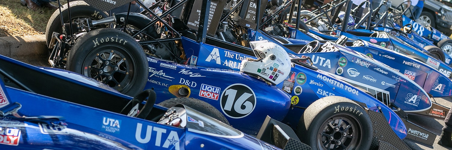Row of parked UTA racecars