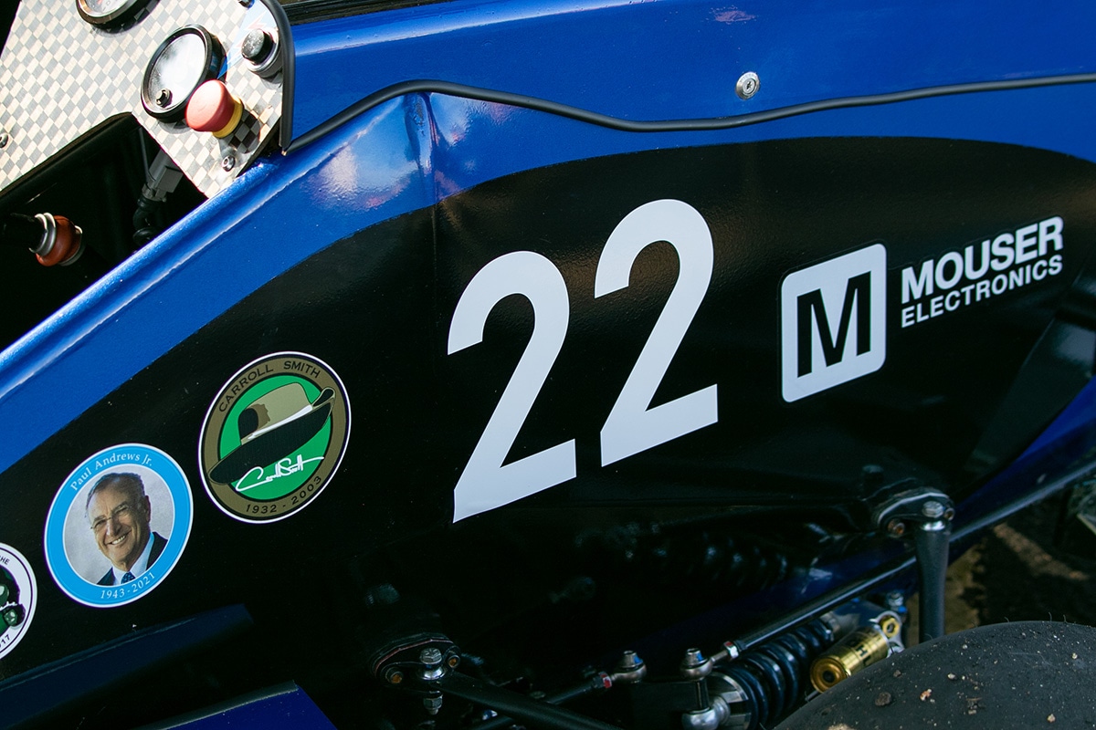 Close-up picture of a UTA racecar. the car has a big '22' printed on it next to a Mouser logo - opens in a new tab